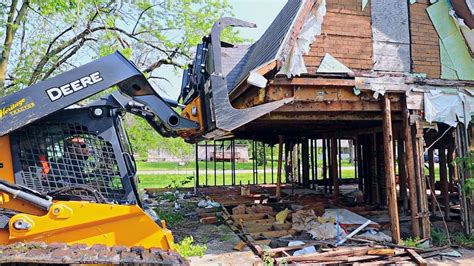 house demolition with skid steer|Tearing Down a House with a Skid Steer .